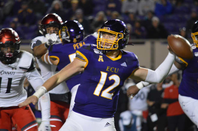 ECU quarterback Holton Ahlers set the all-time ECU and AAC records with 535 yards passing against Cincinnati.