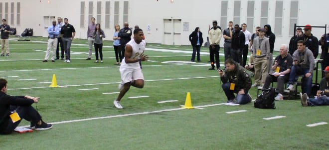Frankie Williams runs through a drill at Purdue's pro day, which was attended by scouts from 23 NFL teams. 