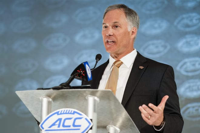 Clawson speaking in the big room on the ACC Network 