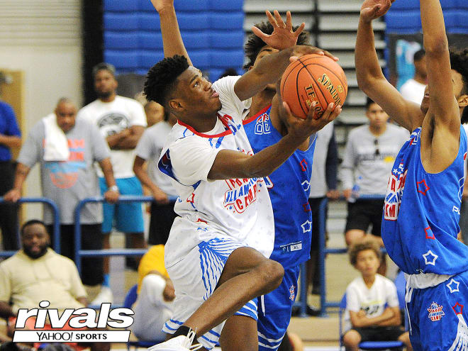 Four-star forward Tyreek Smith attempts to score through traffic at the Pangos All-American Camp