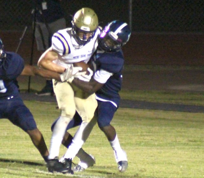 Jake Smith grabs a passed zipped to him from Jake Farrell for his fifth score of the first half.  Notre Dame went on to defeat Fairfax in Laveen, 41-32 in the season opener for both schools.