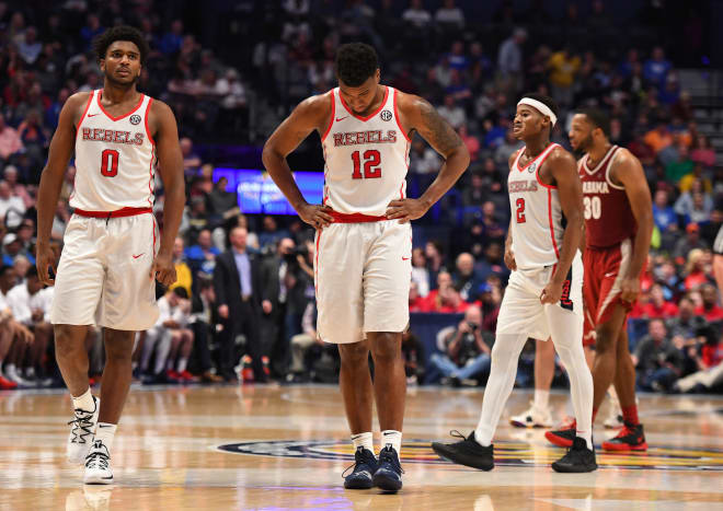 Ole Miss' Blake Hinson (0), Bruce Stevens (12) and Devontae Shuler look on in the final seconds of the Rebels' SEC Tournament loss to Alabama Thursday. 