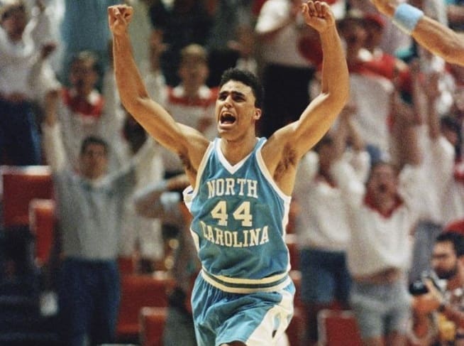 Rick Fox celebrates in 1990 after one of the most memorable moments in Carolina basketball history.