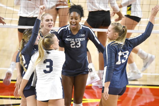 Penn State middle blocker Kaitlyn Hord celebrates a point with her team