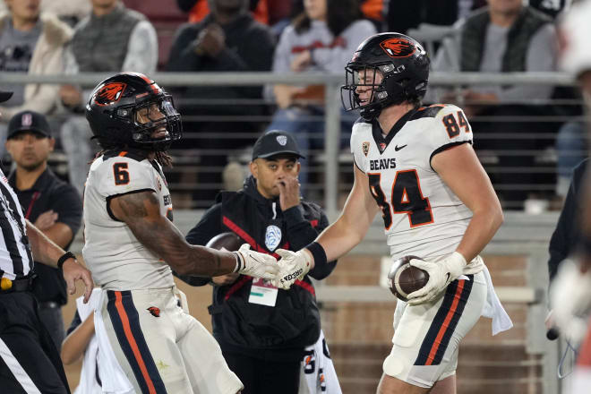 Jack Velling (right) celebrates with Damien Martinez (left)