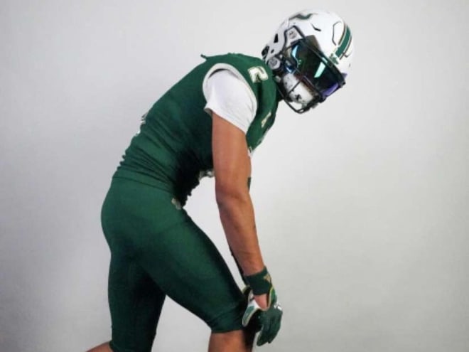 Porter posing during a visit to USF