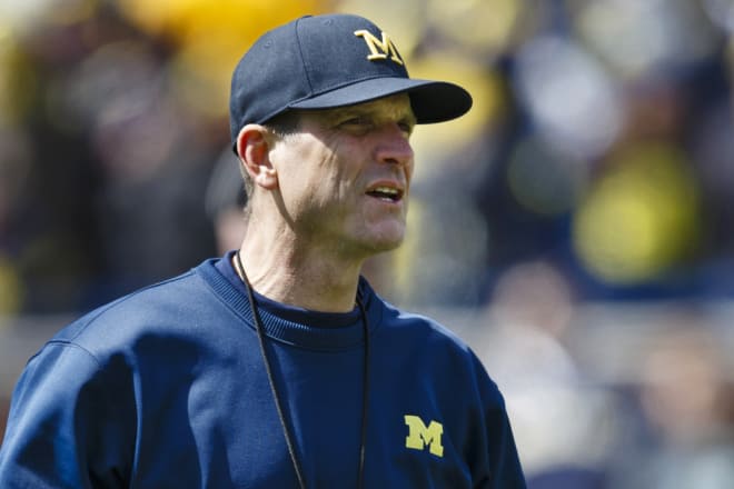 Michigan coach Jim Harbaugh and his team will host the spring game Saturday night.
