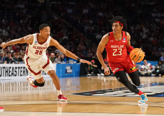  Maryland Terrapins guard Ian Martinez (23) drives past Alabama Crimson Tide guard Nimari Burnett (25) during the second half at Legacy Arena. Mandatory Credit: Marvin Gentry-USA TODAY Sports