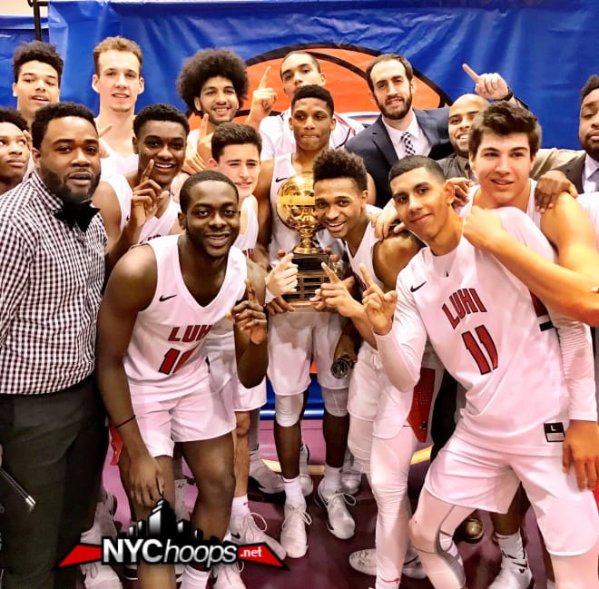 The Long Island Lutheran Crusaders hold up the 2018 SNY Invitational championship trophy