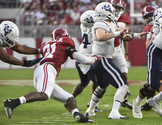 Will Anderson Jr. (31) pressures Utah State Aggies quarterback Logan Bonner (1) in the first half at Bryant-Denny Stadium. Photo | Gary Cosby Jr.-USA TODAY Sports