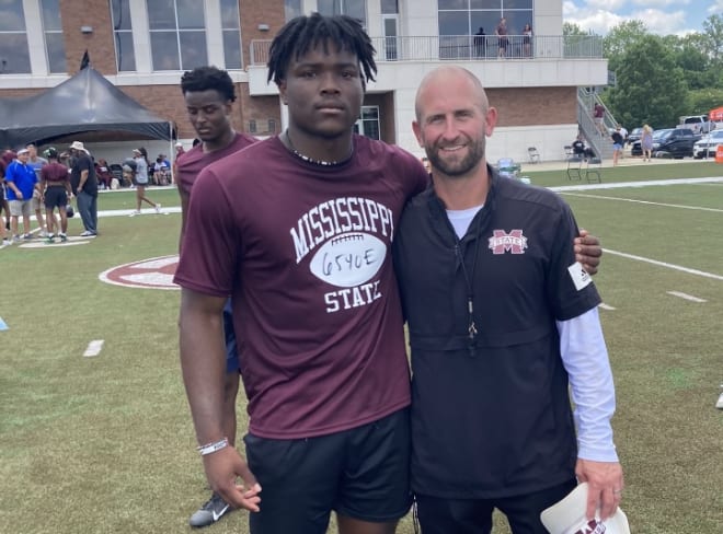 2025 linebacker A.J. Rice with Mississippi State defensive coordinator Matt Brock.