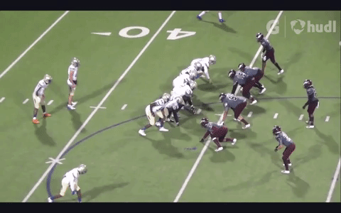 Ezya Dotson-Oyetade pulls from the center spot to clear out a run for five-star RB Camar Wheaton (Hudl)