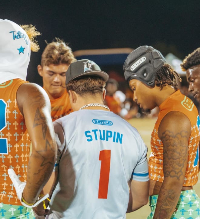 Former SMU receiver Josh Stupin huddles with his 7-on-7 team Trillion Boys.