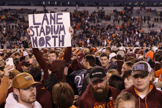 Virginia Tech fans flooded the field at Scott Stadium to celebrate Saturday's dramatic victory over the Wahoos.