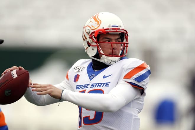Boise State quarterback Hank Bachmeier (19) warms up before the first half of an NCAA college football game Friday, Nov. 29, 2019, in Fort Collins, Colo. For the second straight season, Bachmeier will be the starter when the Broncos open the season. (AP Photo/David Zalubowski)