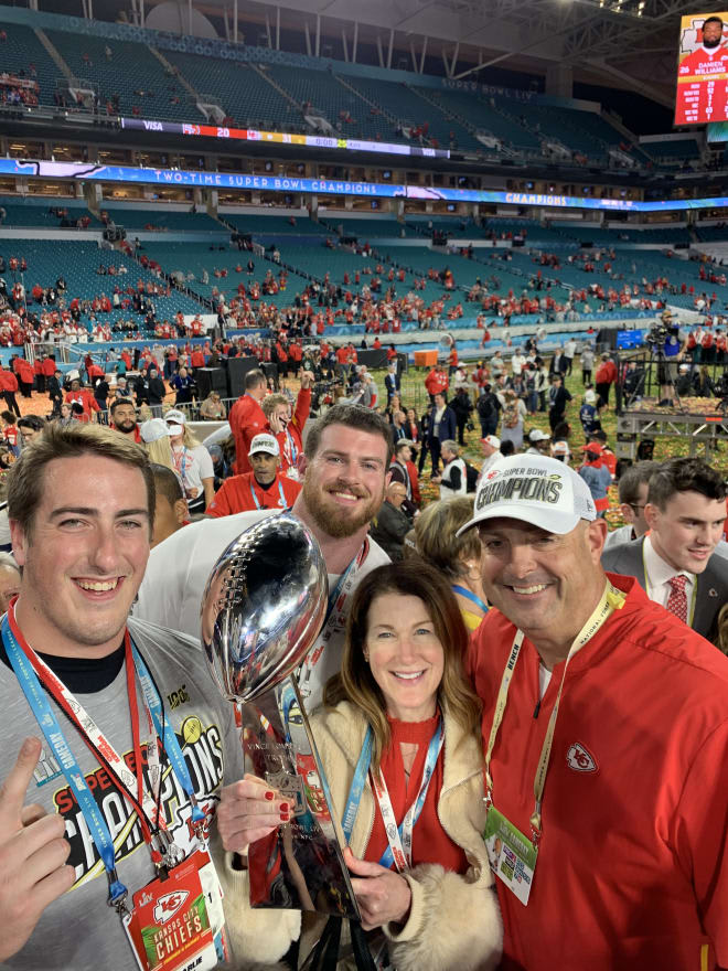 Andy Heck with wife Jennifer and sons Jon and Charlie after last year's Super Bowl title.