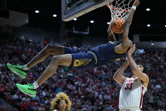 Notre Dame guard Blake Wesley (0) dunks against Alabama's James Rojas (33) in the second half of ND's 78-64 victory, Friday in NCAA Tournament action at Viejas Arena. in San Diego.