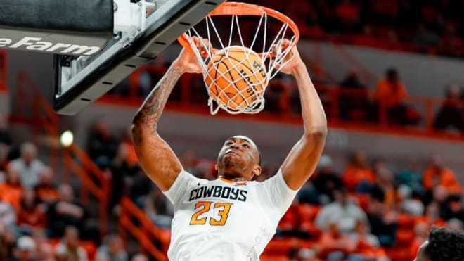 Oklahoma State transfer Brandon Garrison will visit Arkansas.