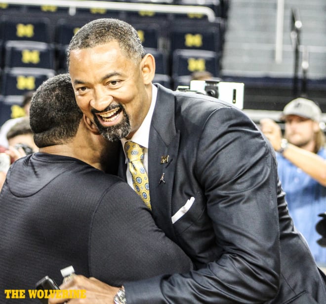 Juwan Howard and Michigan face Iowa Friday in the Big Ten opener.