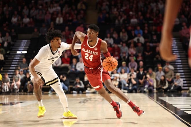 Alabama's Brandon Miller (24) drives by a Vanderbilt guard on Tuesday | Photo Alabama Athletics