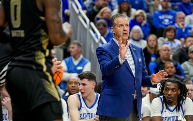 Arkansas head coach John Calipari coaches for Kentucky during an NCAA Tournament matchup with Oakland on March 21.