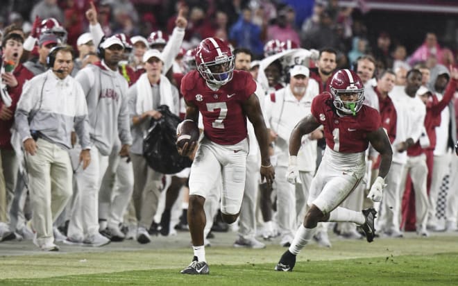 Alabama Crimson Tide wide receiver Ja'Corey Brooks (7) recovers an onside kick attempt by the Auburn Tigers and runs it up the sideline as running back Jahmyr Gibbs (1) trails at Bryant-Denny Stadium. Alabama won 49-27. Photo | Gary Cosby Jr.-USA TODAY Sports