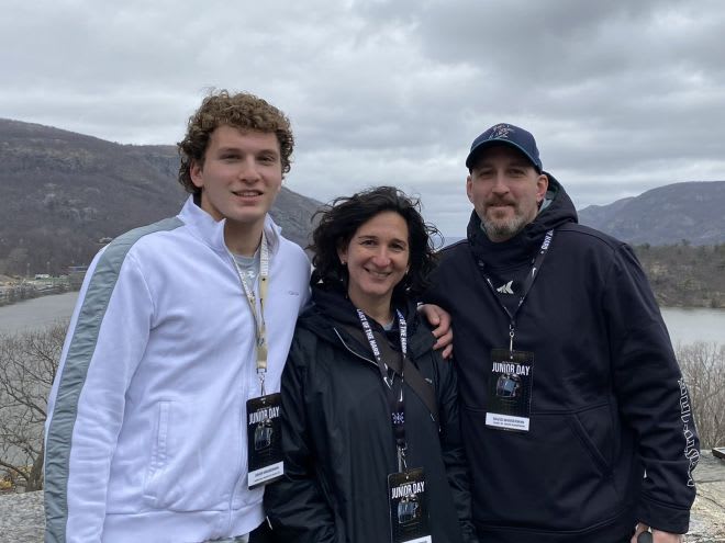 Asher Wasserman is joined by his parents during Saturday's visit to West Point