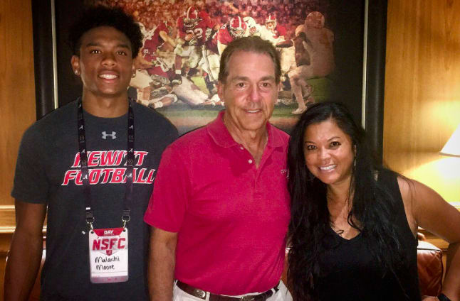 Malachi Moore with Nick Saban and his mother (Penny Moore). 