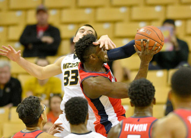 Ole Miss guard Terence Davis is fouled as he drives to the basket in the Rebels' win at Missouri Saturday. Davis and the Rebels play host to Texas A&M Wednesday and Baylor Saturday.