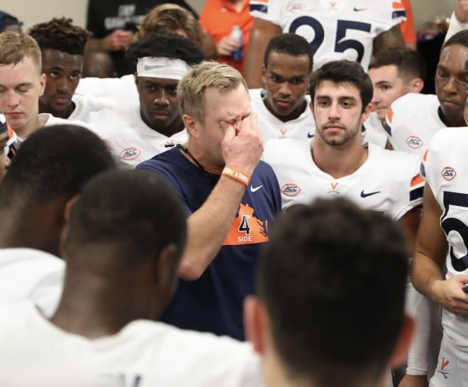 An emotional Bronco Mendenhall addressed his team following the comeback over Louisville.