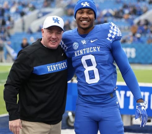 Derrick Baity with Mark Stoops on Senior Day (UK Athletics)