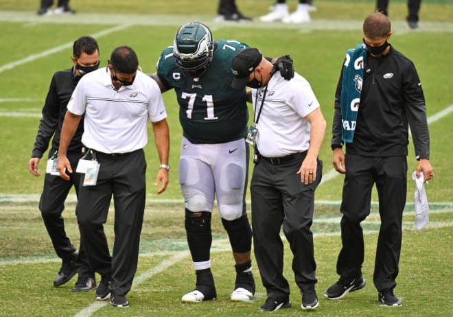 Jason Peters is helped off the field in last week's game against the Bengals.