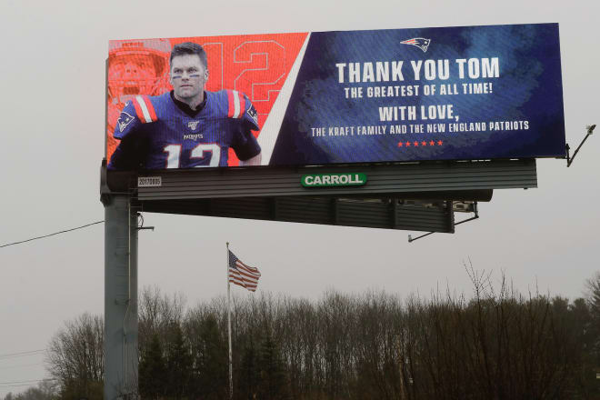 A billboard saying goodbye to former Michigan Wolverines football quarterback Tom Brady