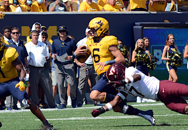 The West Virginia Mountaineers football team utilized two quarterbacks against Virginia Tech.