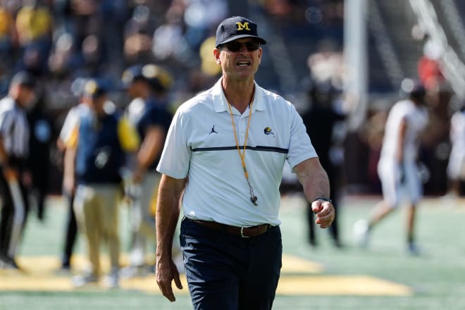 John Harbaugh Presents Game Ball To Fans