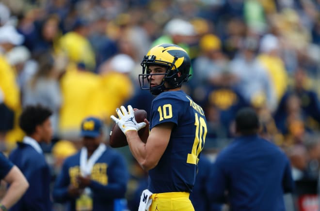 Michigan Wolverines football redshirt sophomore quarterback Dylan McCaffrey completed each of his two passes on Saturday night.
