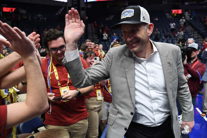 Alabama Crimson Tide head coach Nate Oats celebrates after cutting down the net following a win against the Texas A&M Aggies at Bridgestone Arena. Photo | Christopher Hanewinckel-USA TODAY Sports