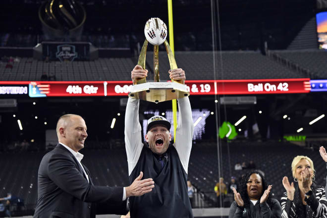 David Braun celebrates Northwestern's Las Vegas Bowl win over Utah.