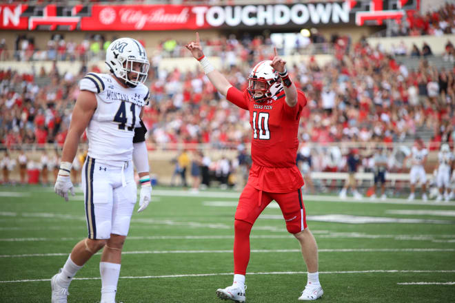 Texas Tech quarterback Alan Bowman celebrates after the Red Raiders score a touchdown in their season opener against Montana St.