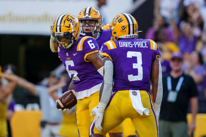 Former LSU Tigers wide receiver Deion Smith (6) reacts to making a touchdown against Central Michigan Chippewas during the first half at Tiger Stadium. Smith committed to Ole Miss Monday. Mandatory Credit: Stephen Lew-USA TODAY Sports