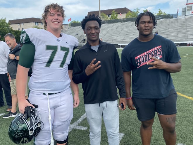 Justin Taylor (center) and Roderick Pierce came to support their future teammates. 