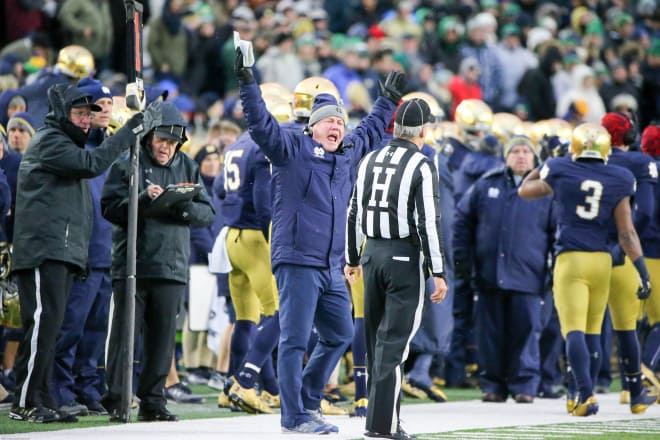 Brian Kelly argues with an official during Saturday's game.