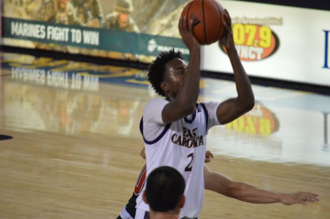 Tristen Newton drives in the paint to score two of his 20 points in his debut as a Pirate in an 80-68 win over VMI.