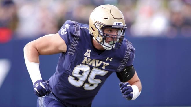 Defensive end Jacob Busic, who spent the past four years at Navy, is the latest UCLA football commit.