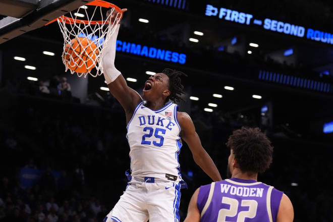 Mark Mitchell throws down a dunk against James Madison on Sunday. 