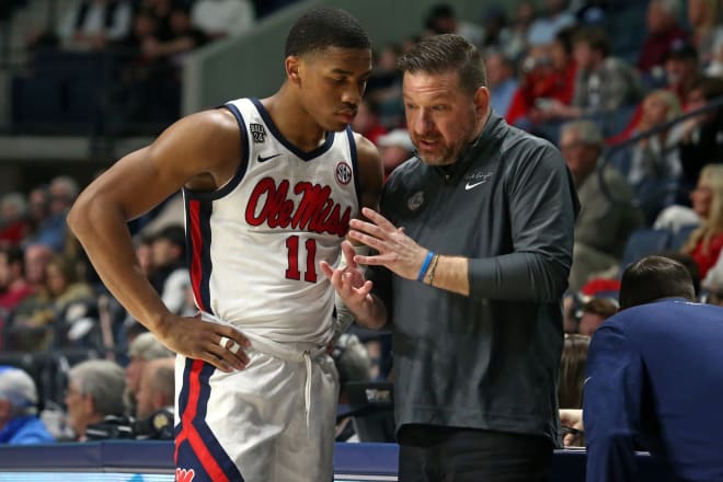 Ole Miss Rebels head coach Chris Beard (right) talks with guard Matthew Murrell (11) during the second half against the Alabama Crimson Tide at The Sandy and John Black Pavilion at Ole Miss. Mandatory Credit: Petre Thomas-Imagn Images