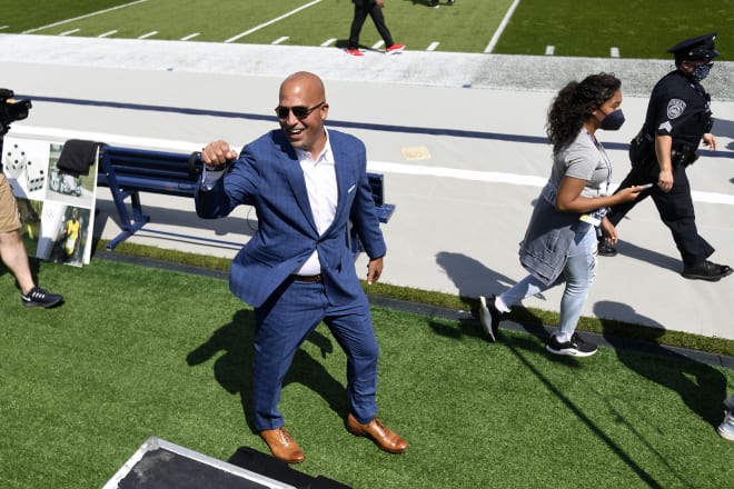 Penn State head coach James Franklin greets a stadium worker while arriving to Beaver Stadium before the NCAA college football game against Ball State in State College, Pa., on Saturday, Sept.11, 2021. (AP Photo/Barry Reeger)
