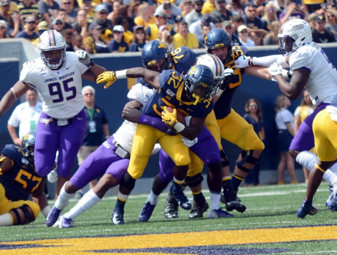 Three running backs played for the West Virginia Mountaineers football team in the opener.
