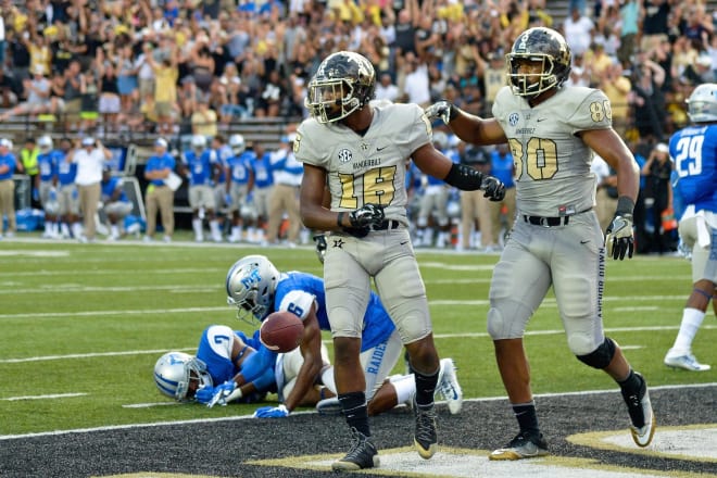 Kalija Lipscomb (16) celebrates a touchdown against MTSU last year. 