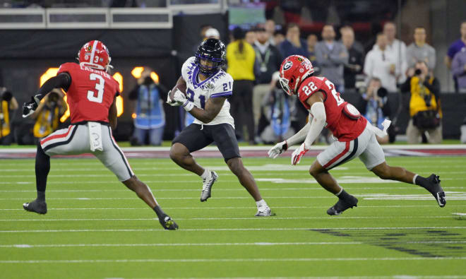 Former TCU running back Corey Wren (21) carries the ball in the 2022 CFP national title game